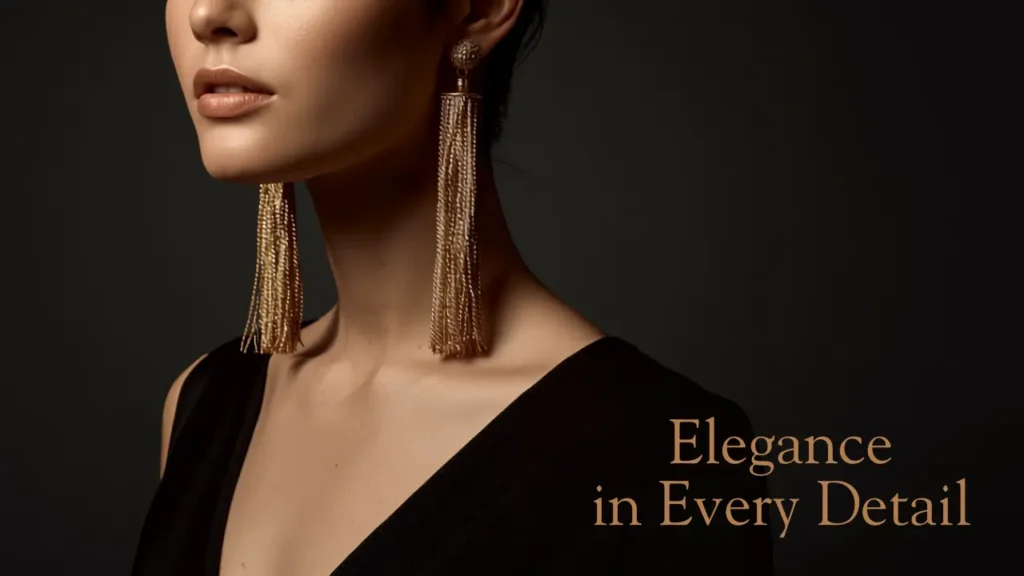 Long gold tassel earrings paired with a little black dress