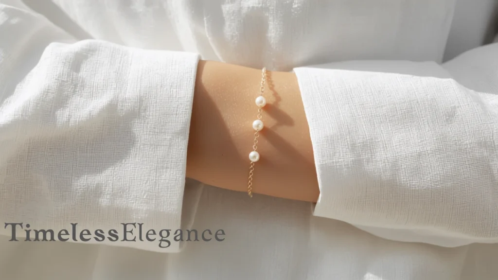 Freshwater pearl bracelet worn with a crisp white linen blouse